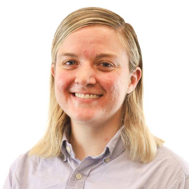 A white woman with shoulder length blonde hair